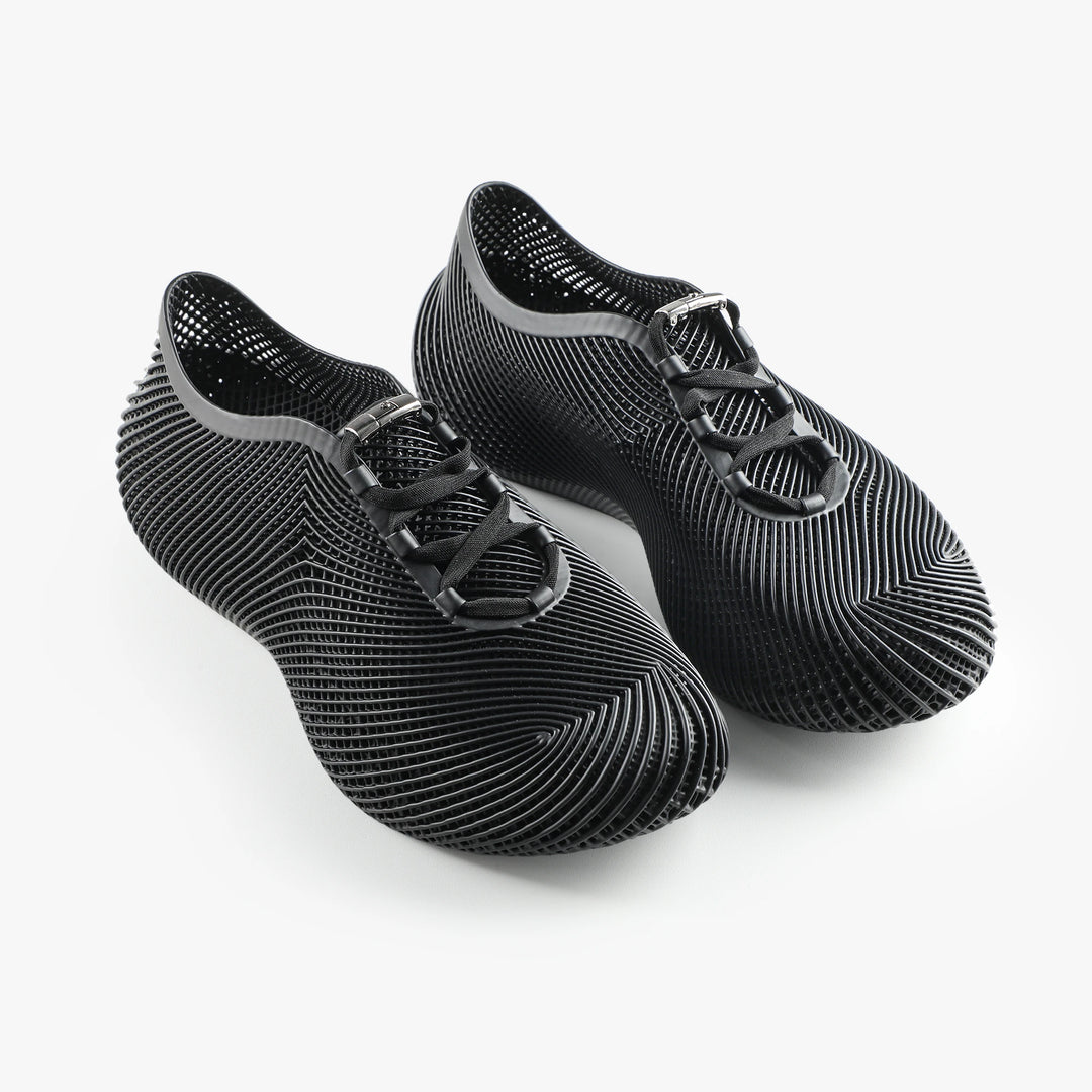 Black 3D printed sneakers modern slip-on style