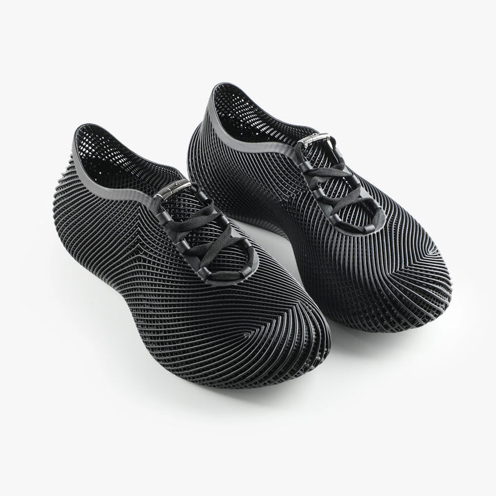 Black 3D printed sneakers modern slip-on style