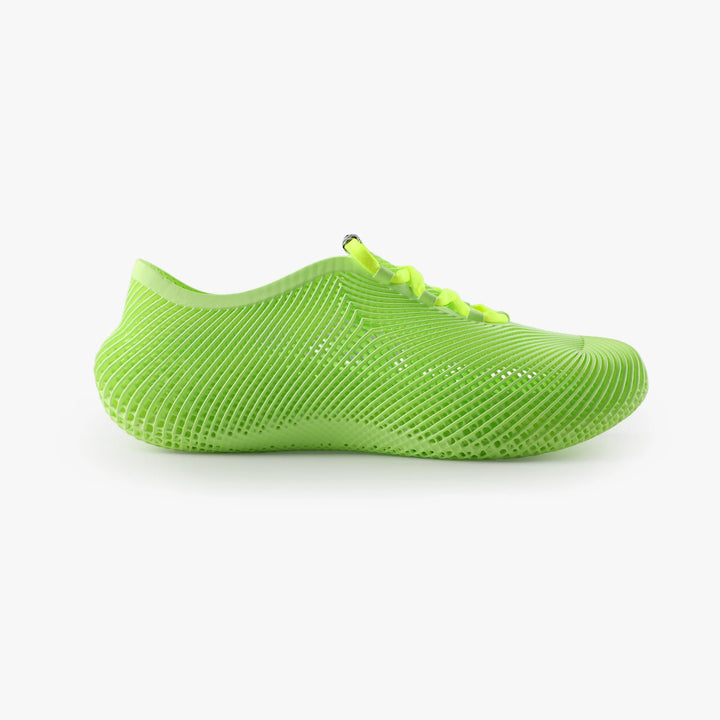 Green 3D printed shoes side profile breathable texture