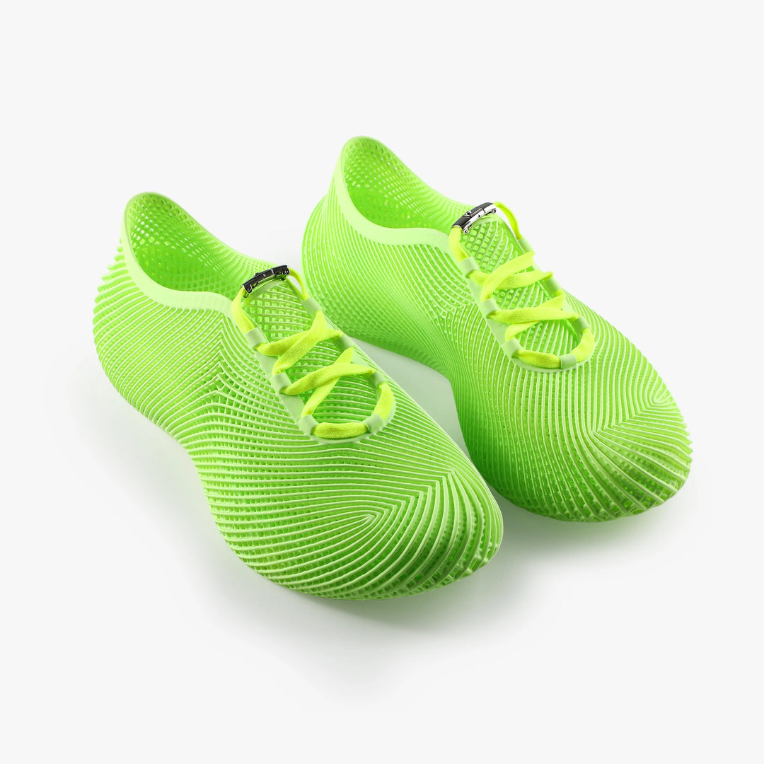 Green 3D printed shoes side profile breathable texture
