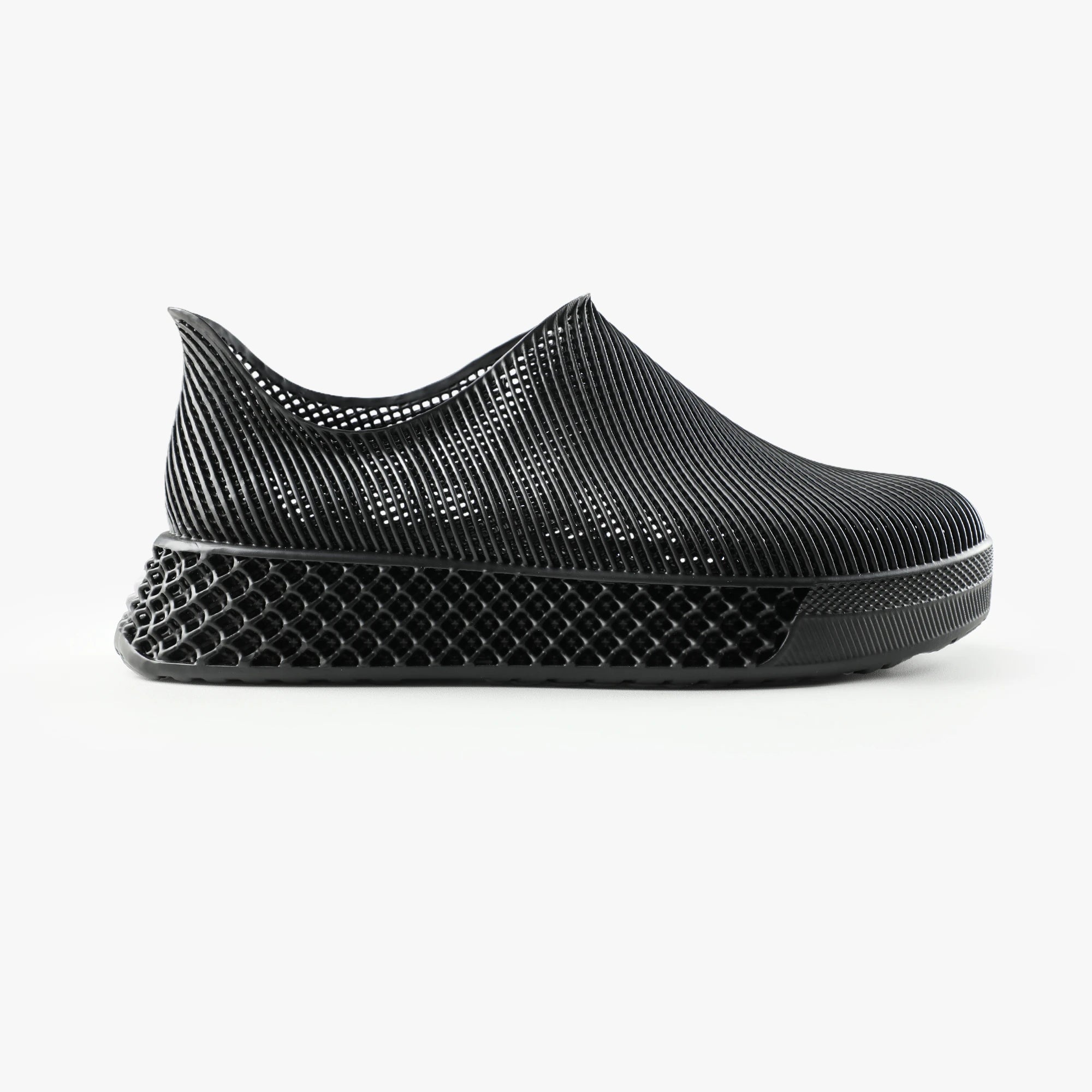 Side view of black 3D printed sneakers