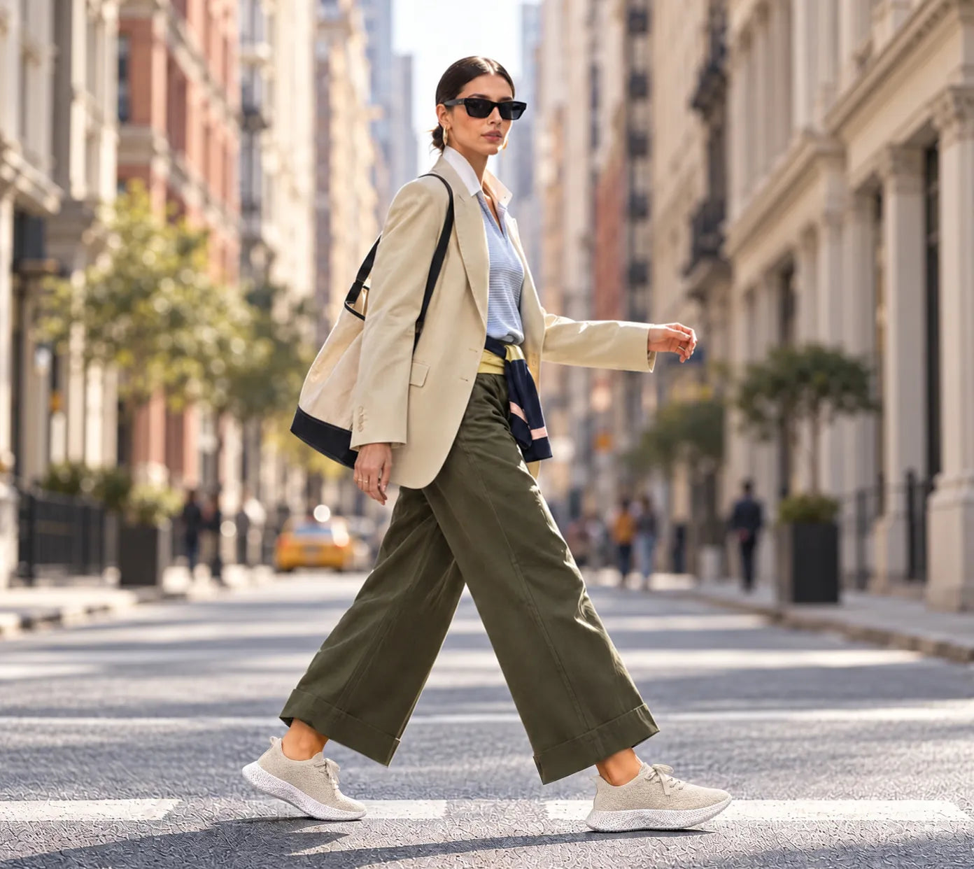 Woman walking across a city street in Braidge 3D printed sneakers