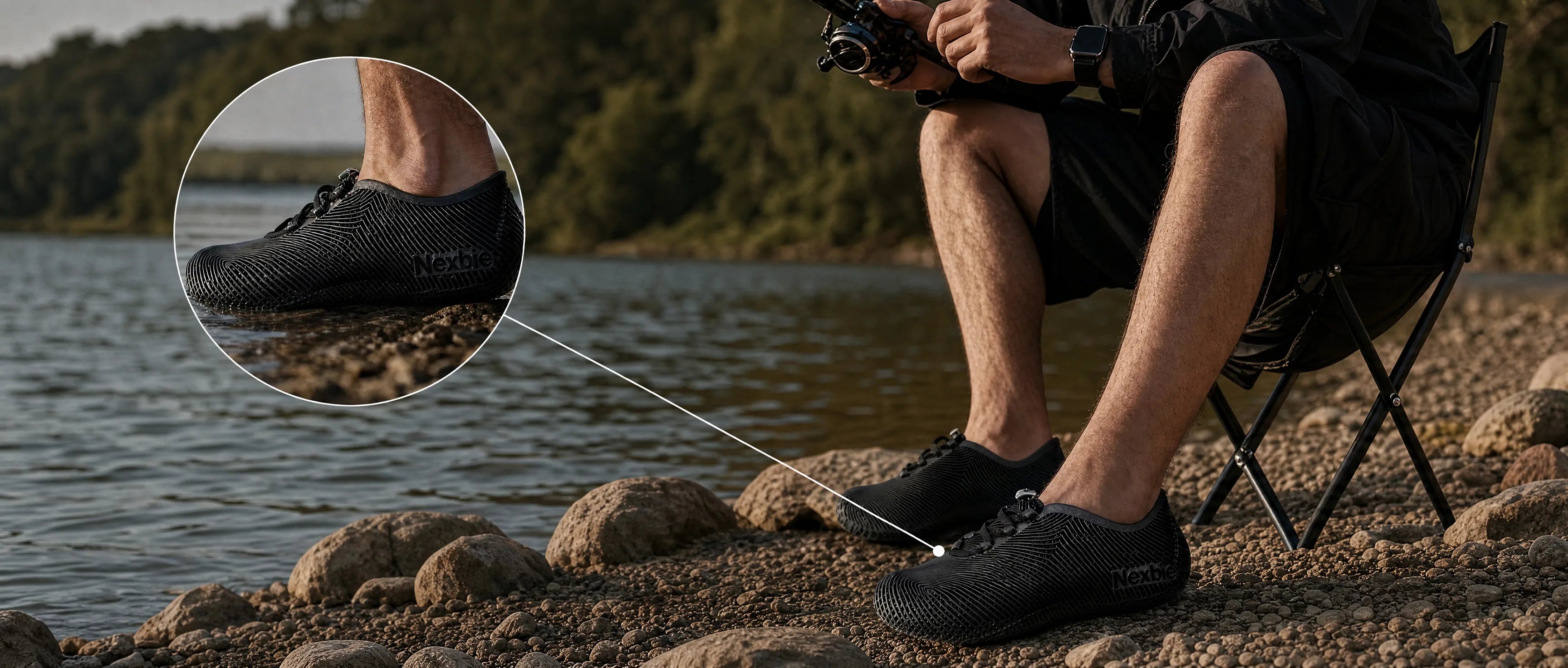 Person relaxing by a rocky shore wearing Aeroraise sneakers